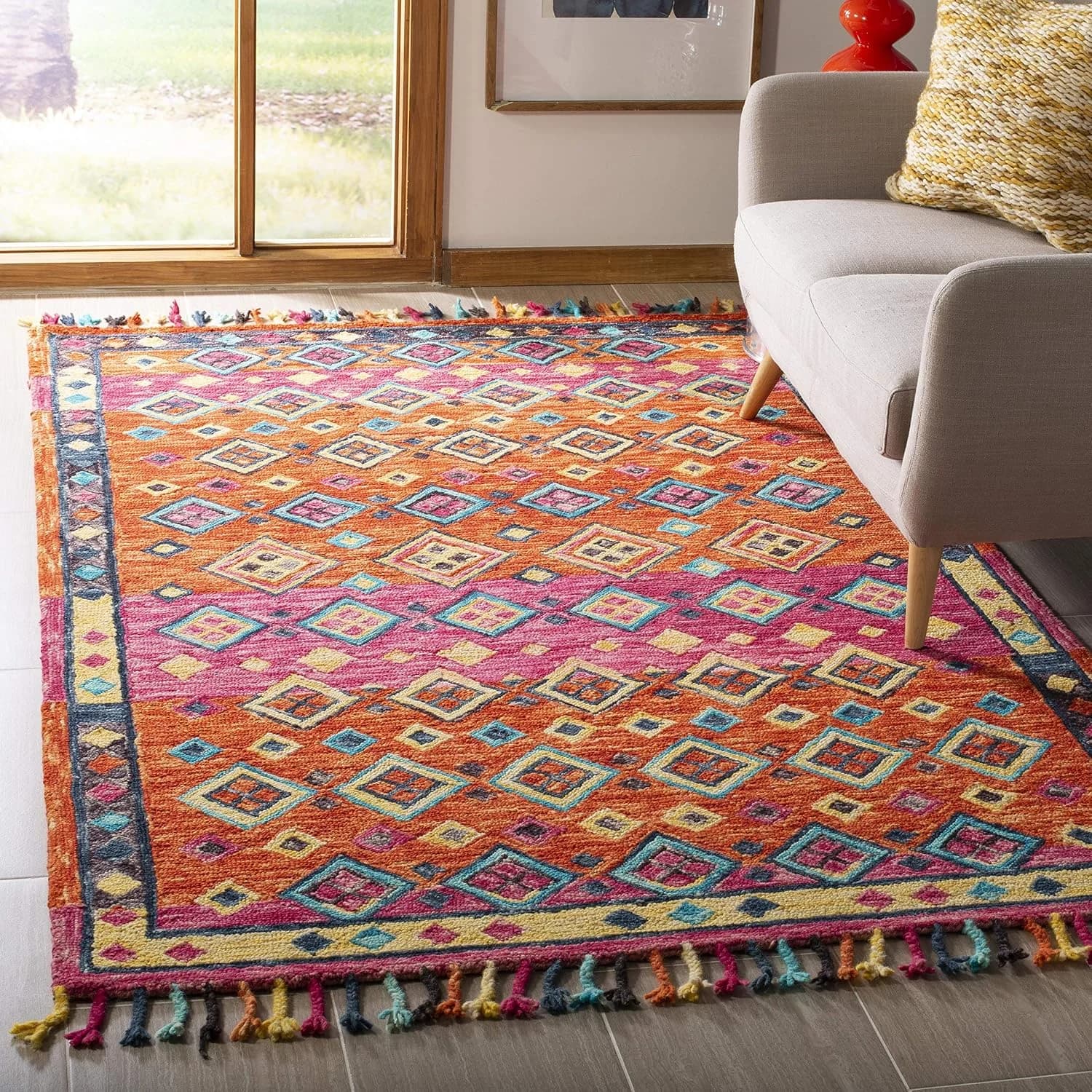 SAFAVIEH Aspen Collection Area Rug - 5' x 8', Orange & Fuchsia, Handmade Boho Braided Tassel Wool, Ideal for High Traffi